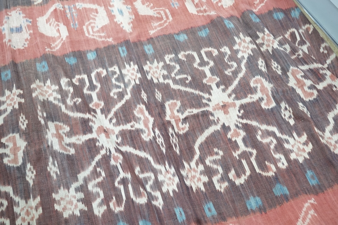 A Sumbanese shoulder cloth, an Indian chain stitch panel and a finely woven silk stole